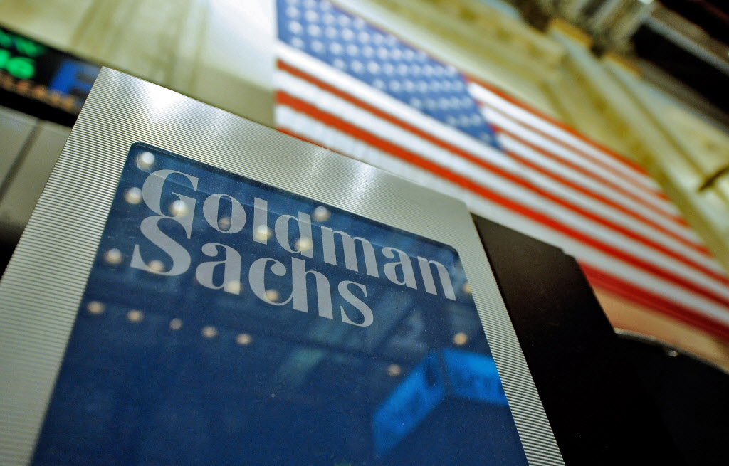 epa04024436 (FILE) A file photo dated 19 January 2011 showing a sign at the Goldman Sachs both on the floor of the New York Stock Exchange after the Opening Bell in New York, New York, USA. Goldman Sachs Group, Inc. on 16 January 2014  reported net revenues of $34.21 billion and net earnings of $8.04 billion for the year ended December 31, 2013. Diluted earnings per common share were $15.46 compared with $14.13 for the year ended December 31, 2012. Return on average common shareholders’ equity (ROE) (1) was 11.0 per cent for 2013. Fourth quarter net revenues were $8.78 billion and net earnings were $2.33 billion. Diluted earnings per common share were $4.60 compared with $5.60 for the fourth quarter of 2012 and $2.88 for the third quarter of 2013.  EPA/JUSTIN LANE *** Local Caption *** 50399116