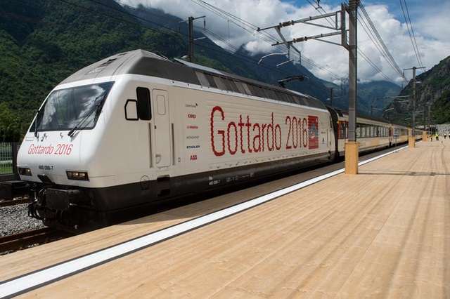 A train arrives at the fairground in Pollegio, Switzerland, Wednesday, June 1, 2016. The construction of the 57 kilometer long tunnel began in 1999, the breakthrough was in 2010. After the official opening on June 1, the commercial opperation will commence on December 2016. (KEYSTONE/Ti-Press/Gabriele Putzu)