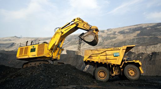 An undated handout photograph shows Komatsu Ltd. heavy machinery extracting coal on a PT Adaro Energy coal mine in Indonesia, provided to the media on Monday, Nov. 24, 2008. PT Bumi Resources and rival PT Adaro Energy may announce third-quarter earnings by Nov. 30, the deadline for the release of the data. Source: PT Adaro Energy via Bloomberg News  EDITOR'S NOTE: EDITORIAL USE ONLY. NO SALES. NO ARCHIVING.