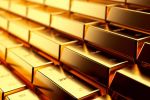 Precios del oro cotizan estables ante baja del dólar